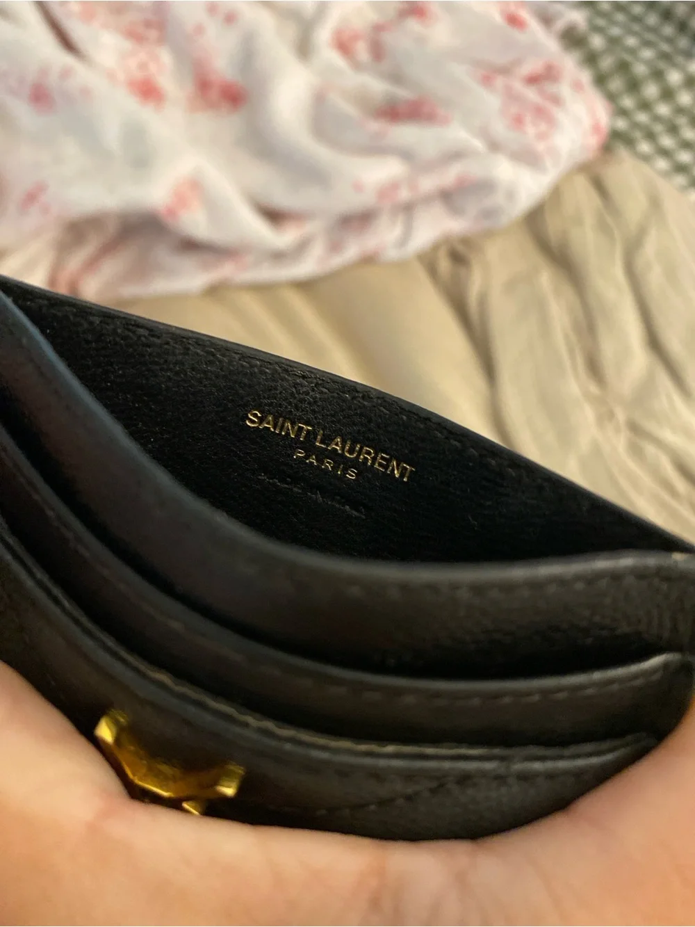 Yves Saint Laurent slots inside from